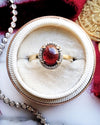 14k Garnet Cabochon with Diamond Halo Ring